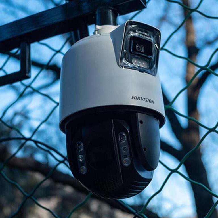 Hikvision outdoor surveillance camera installed on a fence in a Colorado property